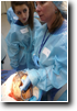 Eliza Johnson, MT and daughter Emma pet the dural tube